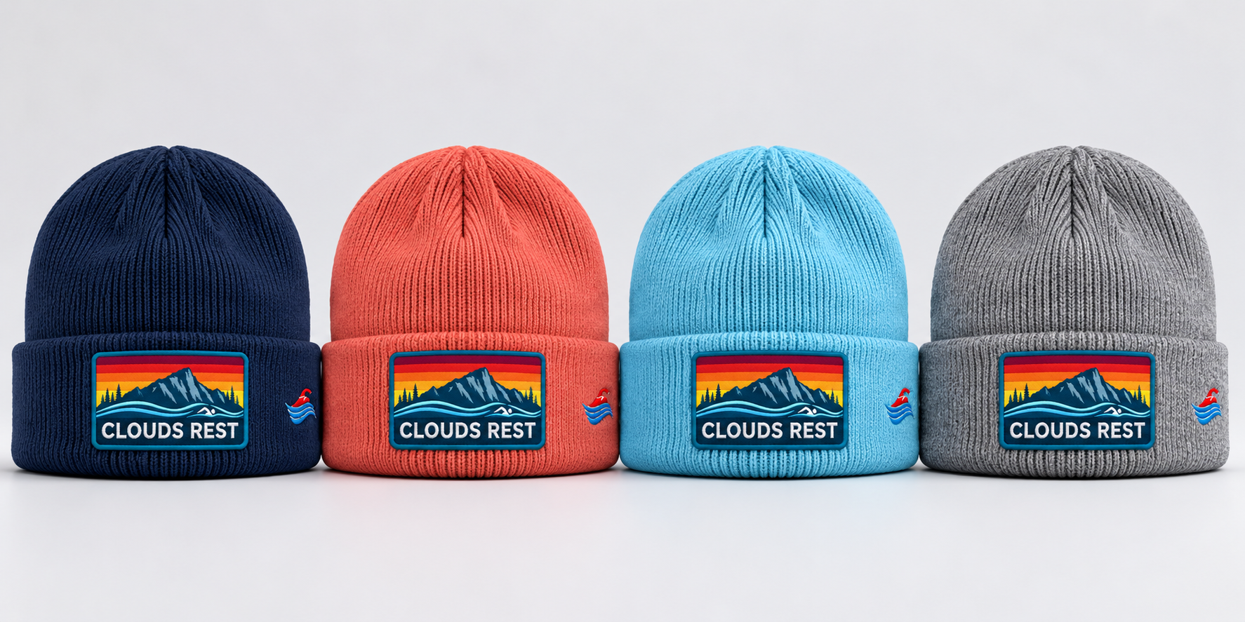 Clouds Rest knit beanies in navy, coral, light blue, and heather gray